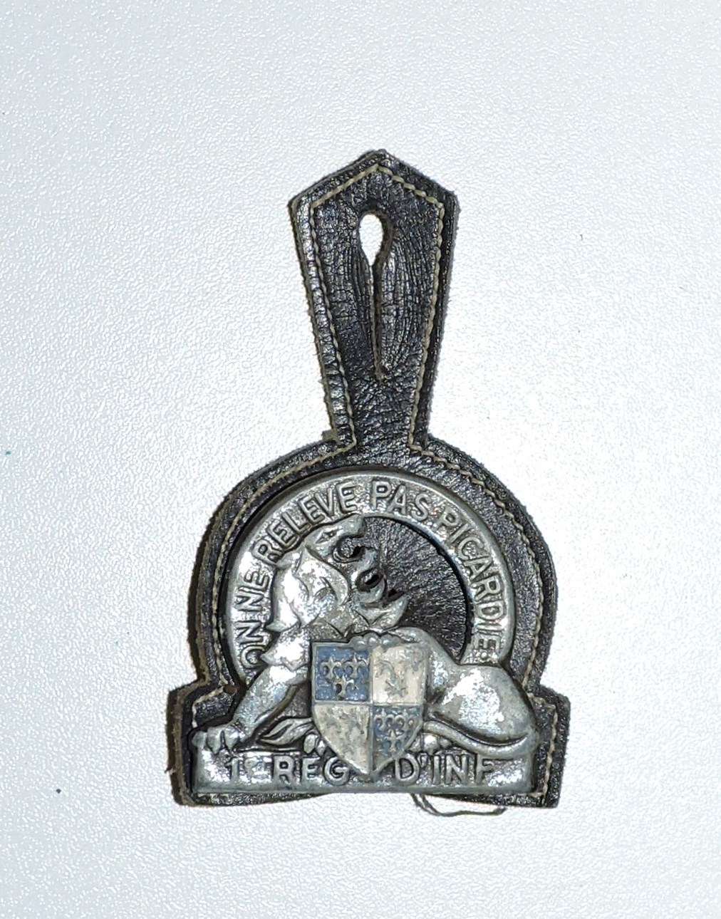 1° Régiment d'Infanterie Lion peint, métal embouti