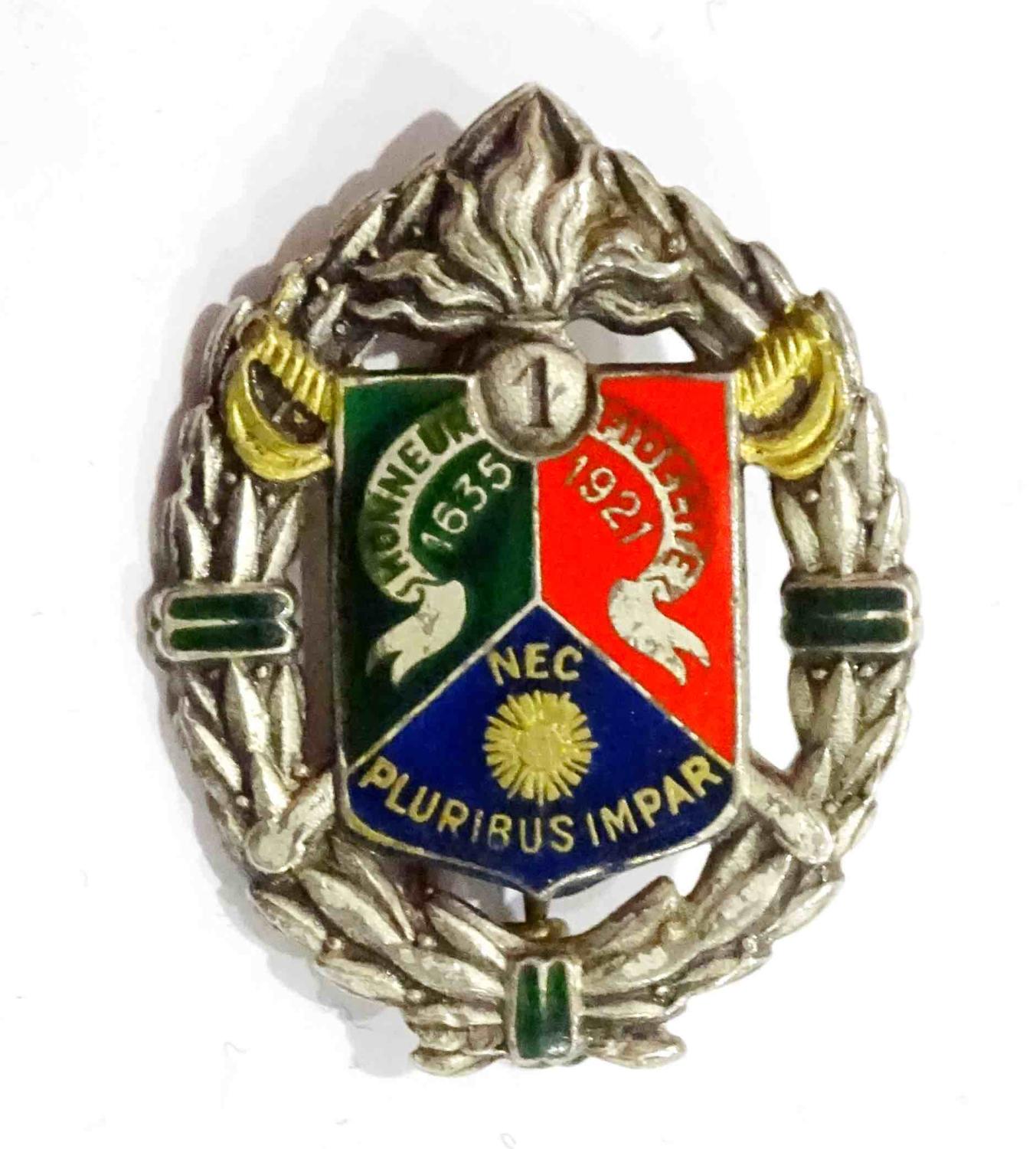 Insigne 1er R&eacute;giment Etranger de Cavalerie Drago, lisse, deux anneaux, marquage bas.