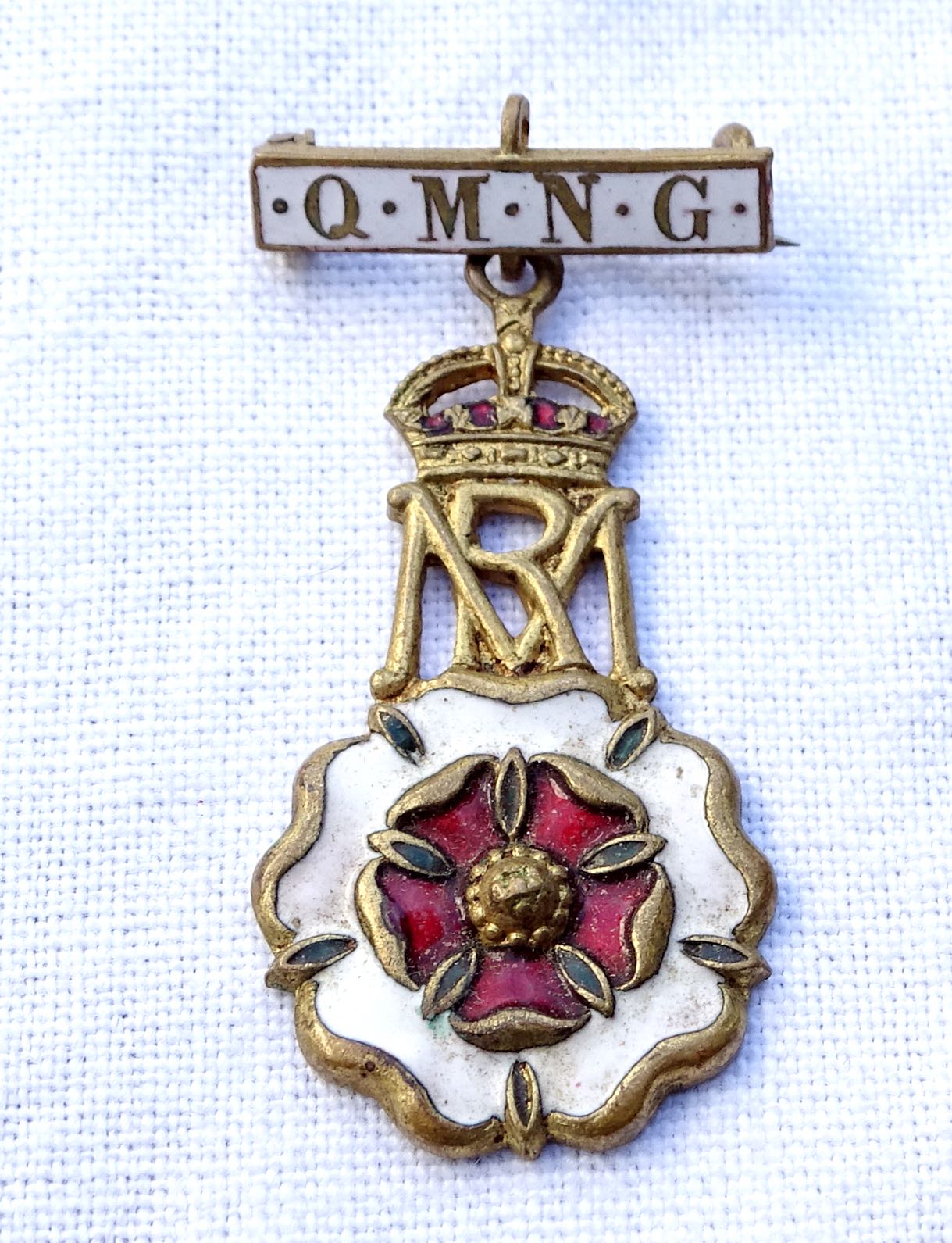 WW1 Badge Q.M.N.G.  Queen Mary Needlework Guild